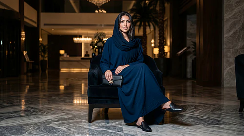 Elegant GCC Woman Gathering in the Lobby Under Moonlight