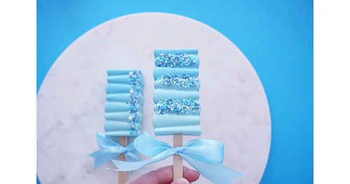 Deliciously Decorated Rectangular Cakesicles for Baby Shower
