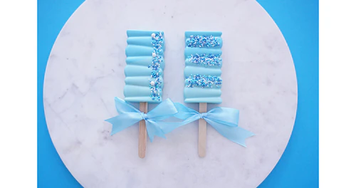 Deliciously Decorated Rectangular Cakesicles for Baby Shower