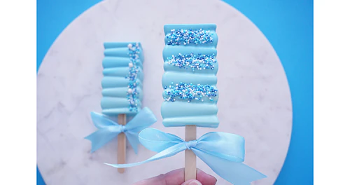 Deliciously Decorated Rectangular Cakesicles for Baby Shower