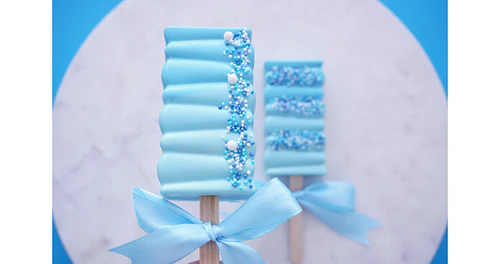 Deliciously Decorated Rectangular Cakesicles for Baby Shower