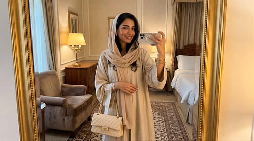 Chic Reflection: A GCC Woman Captures Her Style in a Luxury Hotel's Elegant Mirror